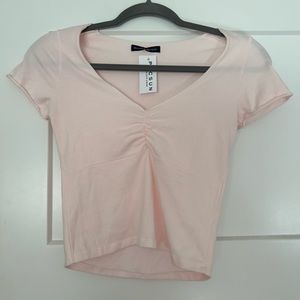 NEW WITH TAGS LIGHT PINK BRANDY MELVILLE RUCHED V NECK CROP TOP